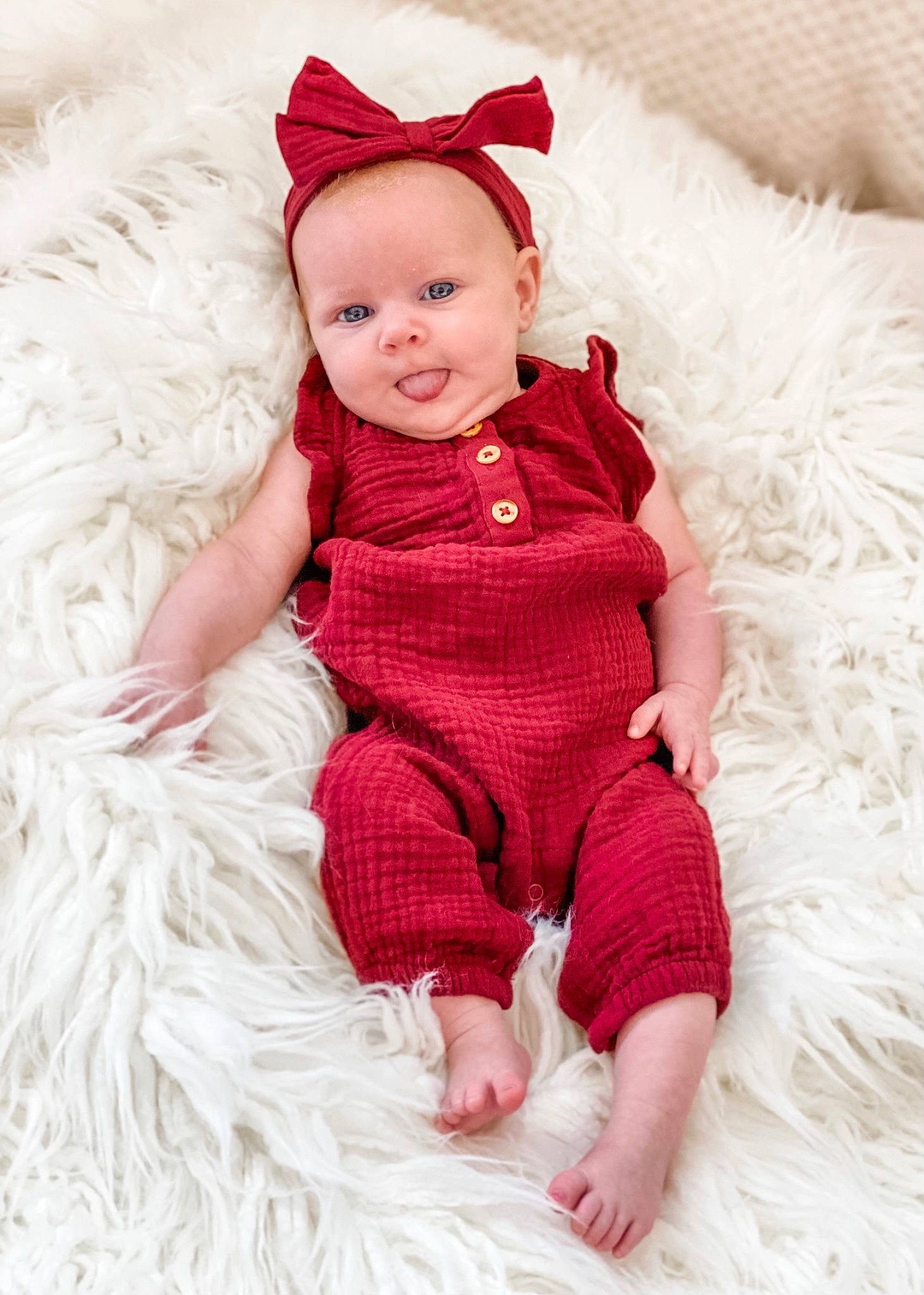 Willow is registered to the contest to win money with this photo: baby, baby_toddler_clothing, child, collar, costume_hat, dress, embellishment, fur, happy, hat, headgear, magenta, pattern, person, pink, sitting, skin, sleeve, smile, textile