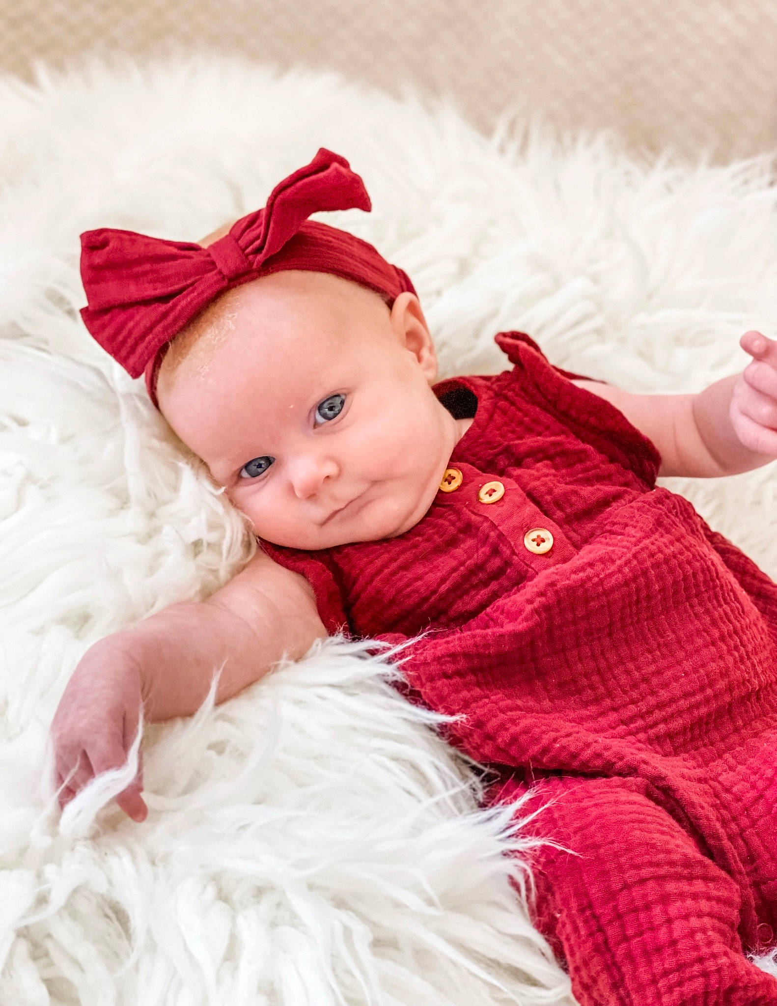 Willow is registered to the contest to win money with this photo: baby, baby_toddler_clothing, child, costume, costume_accessory, costume_hat, embellishment, fashion_accessory, fur, happy, hat, headgear, magenta, pattern, person, pink, sitting, skin, sleeve, smile