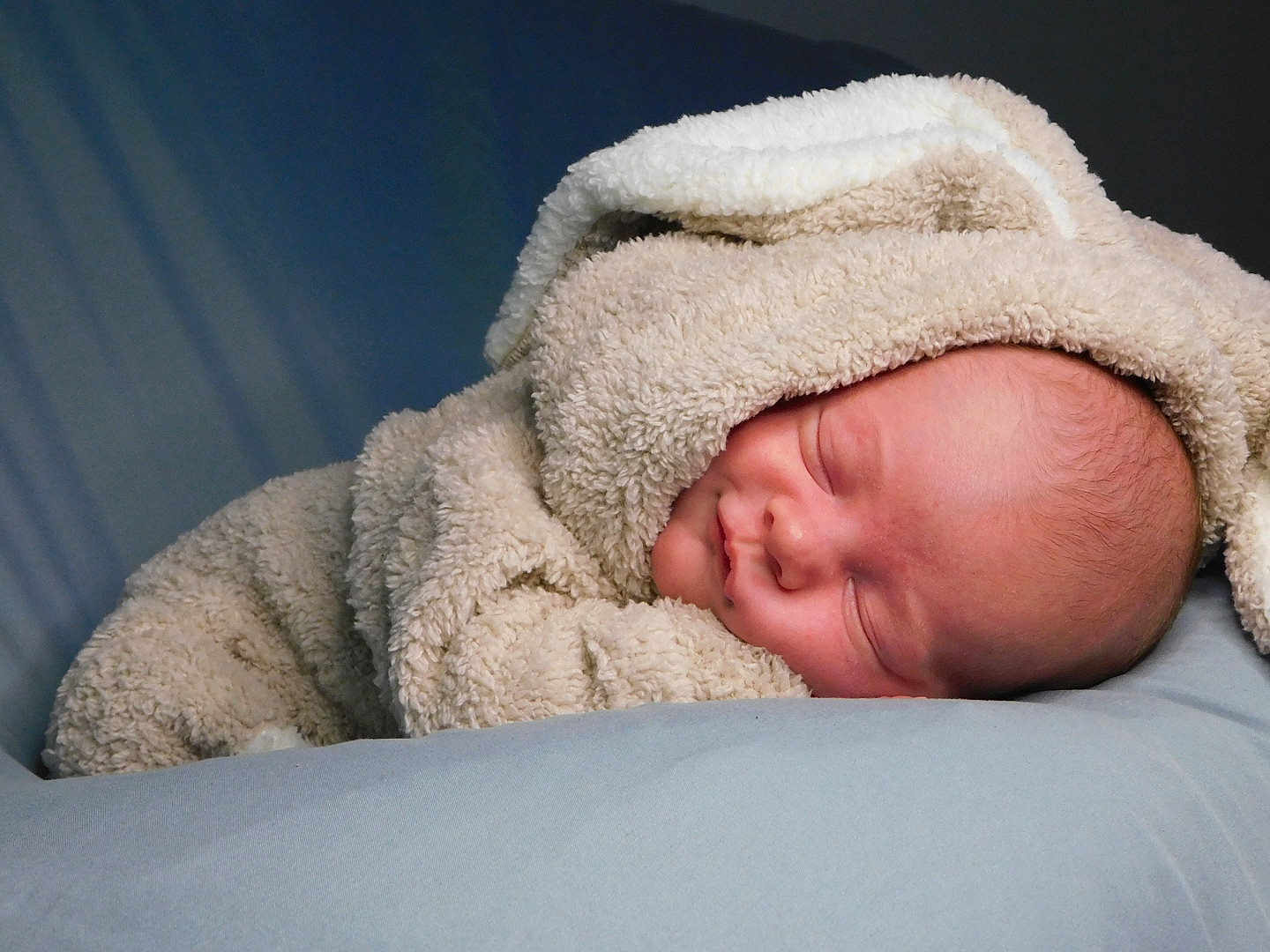 Ethan joined the competition — help win amazing prizes! newborn, baby, sleeping, blanket, hood, soft, cozy, infant, resting, peaceful, face, wrapped, cute, child, portrait, closeup, indoors, warm, comfort, sleep