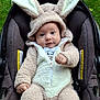 Ethan joined the competition — help win amazing prizes! baby, bunny_costume, car_seat, child, cute, fluffy, outdoor, grass, infant, face, headgear, clothing, portrait, young_child, seat, zipper, hands, eyes, smile, cozy