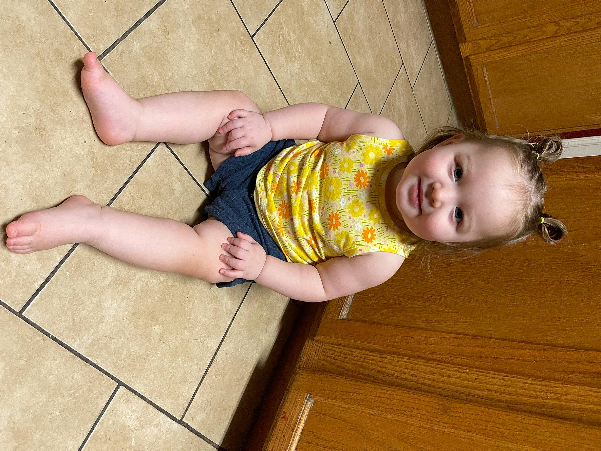 Sutton joined the competition — help win amazing prizes! baby_toddler_clothing, child, dress, finger, floor, flooring, foot, fun, happy, hardwood, head, human_leg, joint, joy, knee, pattern, person, skin, smile, thigh
