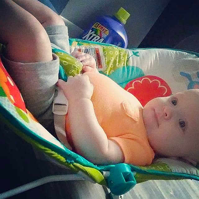 Tommy is registered to the contest to win money with this photo: arm, baby_products, cheek, child, finger, hand, infant, mouth, play, product, thumb, toddler