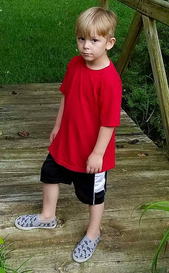 Dylan joined the competition — help win amazing prizes! baby_toddler_clothing, footwear, grass, hair, knee, leg, leisure, people_in_nature, person, photograph, plant, shoe, sleeve, sneakers, sportswear, standing, summer, thigh, toddler, waist