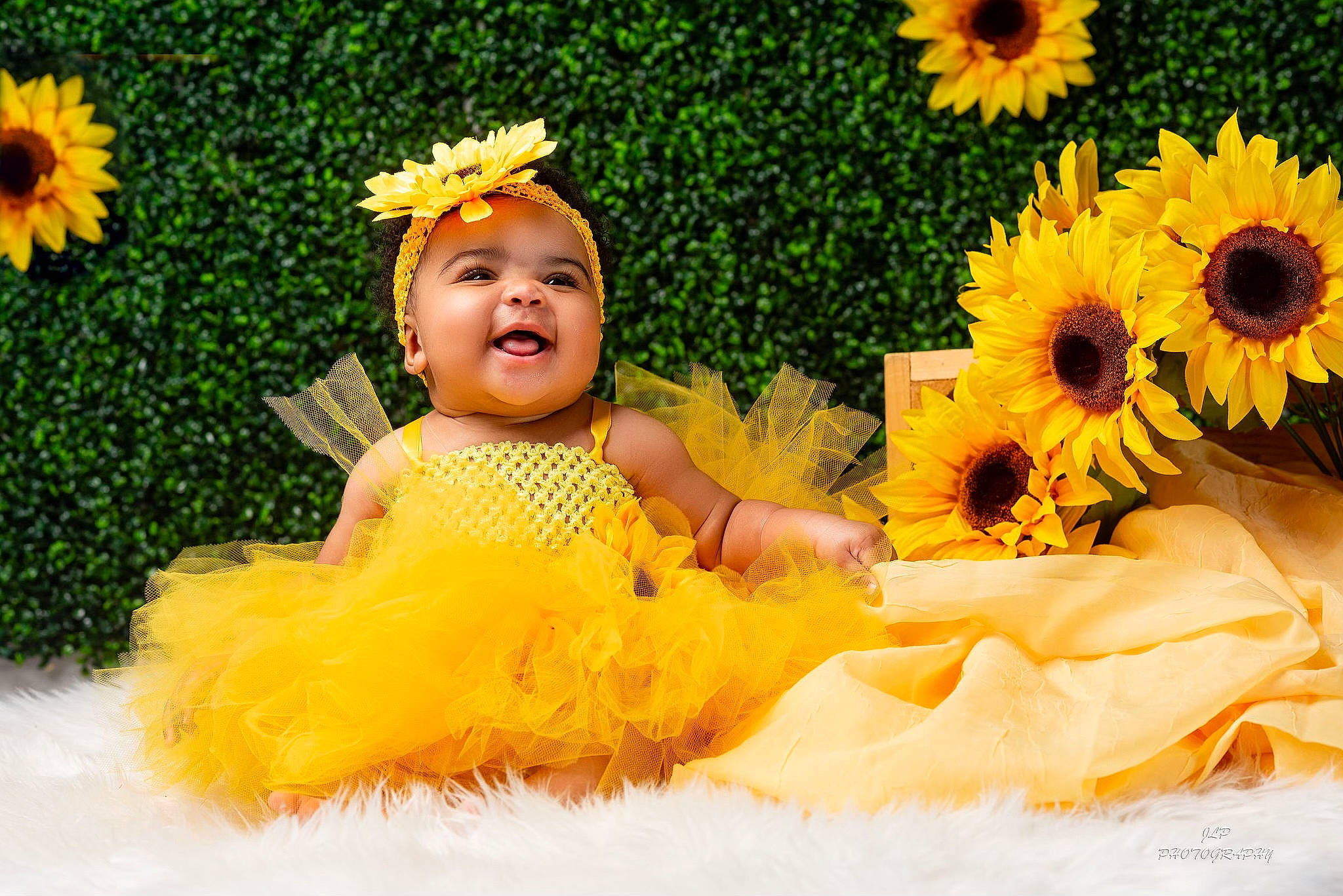 Ariyan joined the competition — help win amazing prizes! baby_toddler_clothing, bouquet, event, facial_expression, flower, flower_arranging, fun, grass, green, happy, headgear, headpiece, headwear, orange, people_in_nature, person, petal, plant, smile, summer