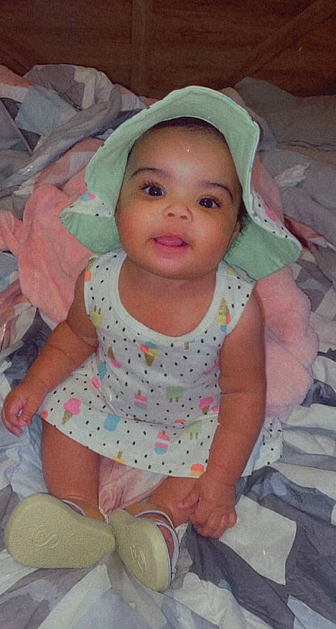 Ariyan is registered to the contest to win money with this photo: baby, baby_toddler_clothing, cheek, child, comfort, eye, face, fun, iris, lip, mouth, organ, pattern, person, pink, product, skin, sleeve, smile, toddler