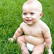 Beau joined the competition — help win amazing prizes! baby, child, infant, smiling, sitting, outdoor, grass, lawn, portrait, blue_eyes, blond_hair, diaper, barefoot, playful, happy, greenery, daylight, toy, nature, photography