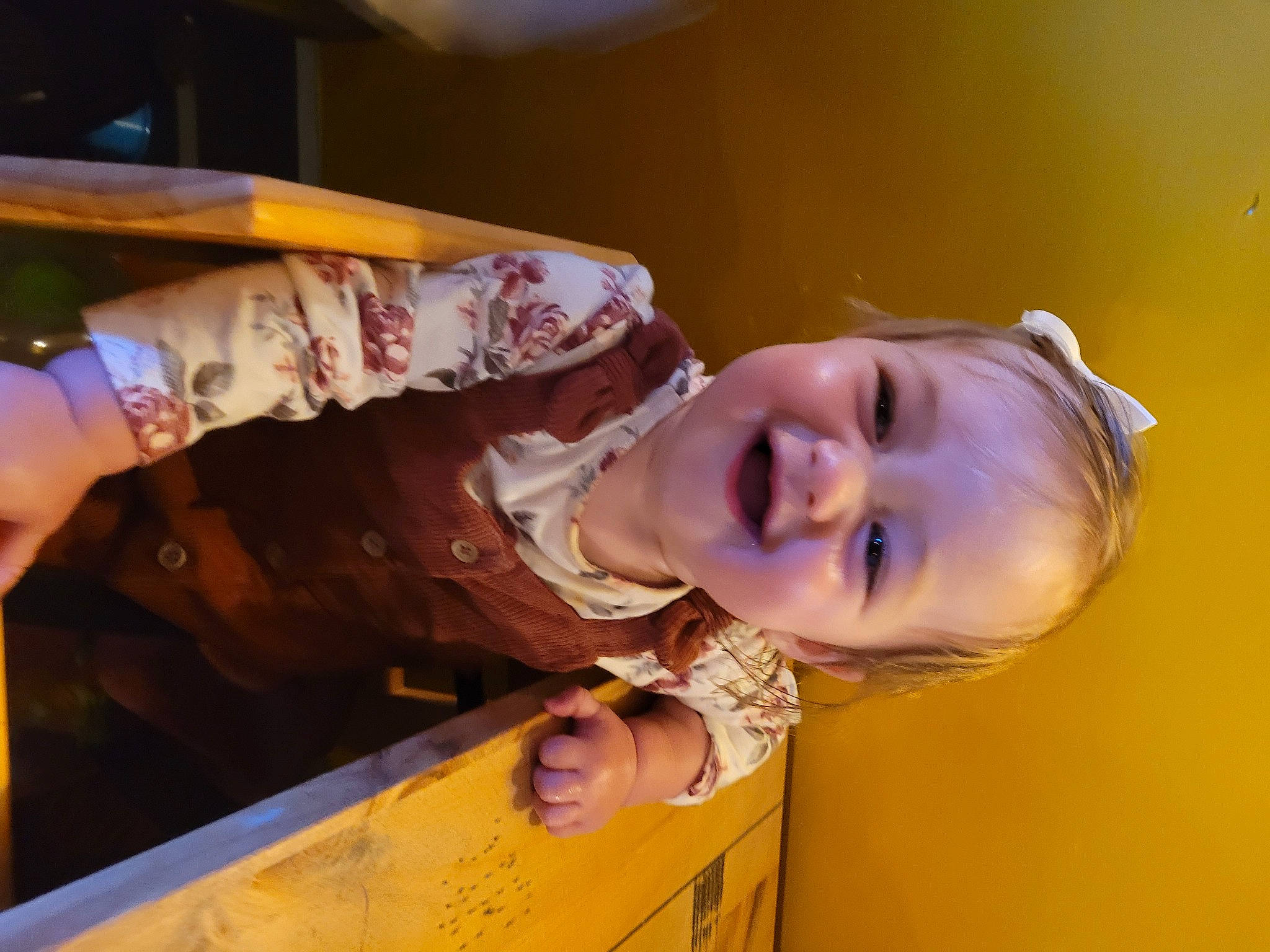 Kayce is registered to the contest to win money with this photo: baby, child, dress, finger, fun, glasses, happy, iris, joy, laugh, leisure, person, play, portrait_photography, room, sitting, smile, toddler, tree, window