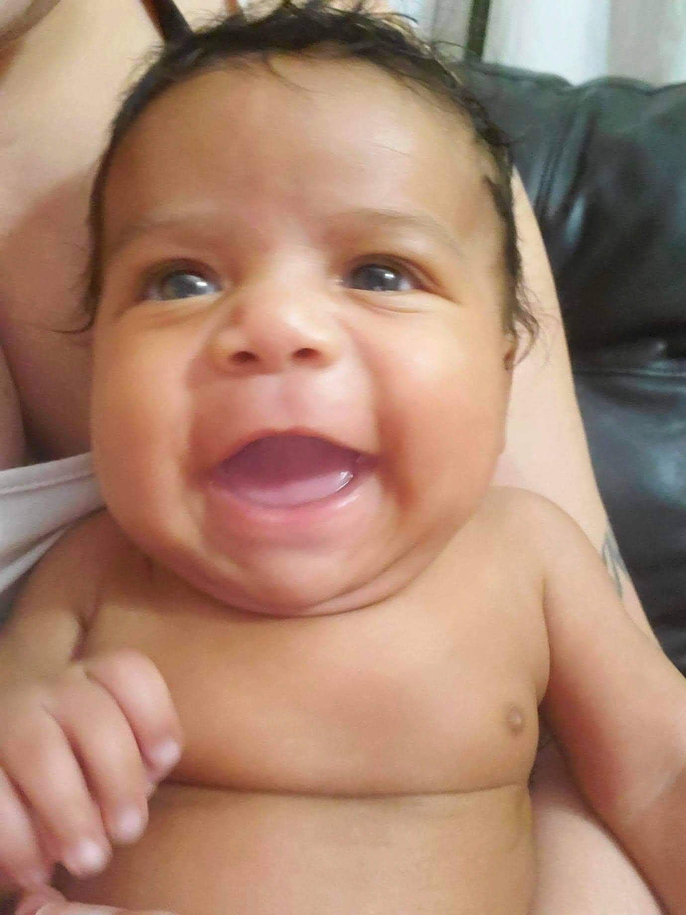 Ezekiel is registered to the contest to win money with this photo: baby, baby_making_funny_faces, cheek, child, chin, close_up, eye, eyebrow, face, facial_expression, forehead, head, lip, mouth, neck, nose, organ, person, skin, smile
