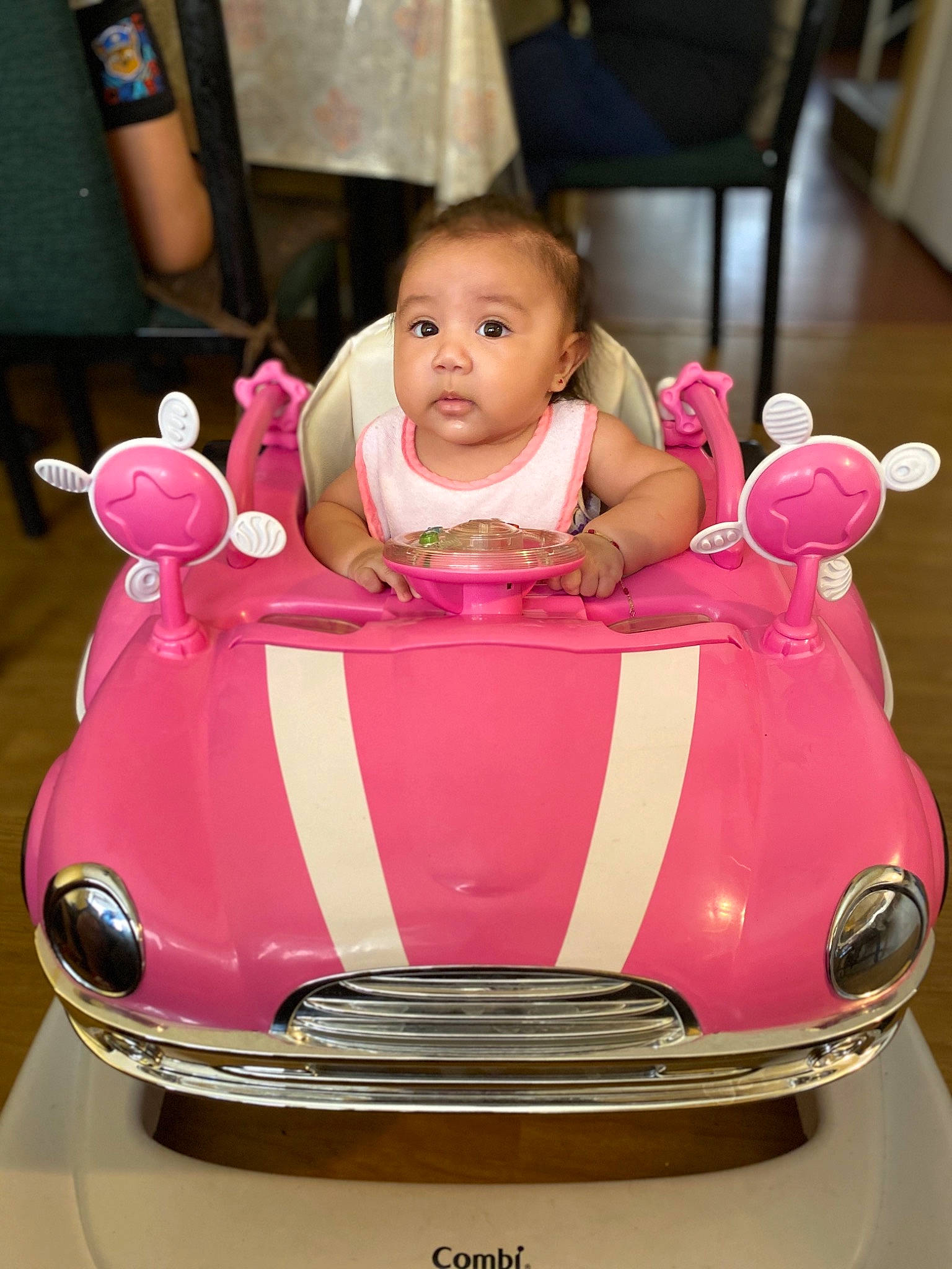 Lexi is registered to the contest to win money with this photo: antique_car, automotive_design, car, child, city_car, classic, classic_car, coupe, magenta, model_car, person, pink, product, toddler, toy, toy_vehicle, vehicle