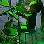 Riley is registered to the contest to win money with this photo: blue_stool, child, concentration, drumsticks, electronic_drum_set, entertainment, fun, green_light, hair_tied, indoor, jeans, music, musical_instrument, performance, person, playing, short_sleeve_shirt, technology, toy, young_child