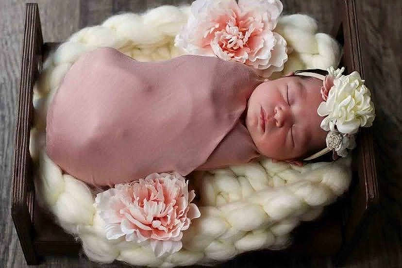 Avayah is registered to the contest to win money with this photo: baby, baby_sleeping, baby_toddler_clothing, child, comfort, cut_flowers, flower, hair_accessory, headband, headpiece, headwear, linens, peach, person, petal, pink, plant, rose, rose_family, sunglasses