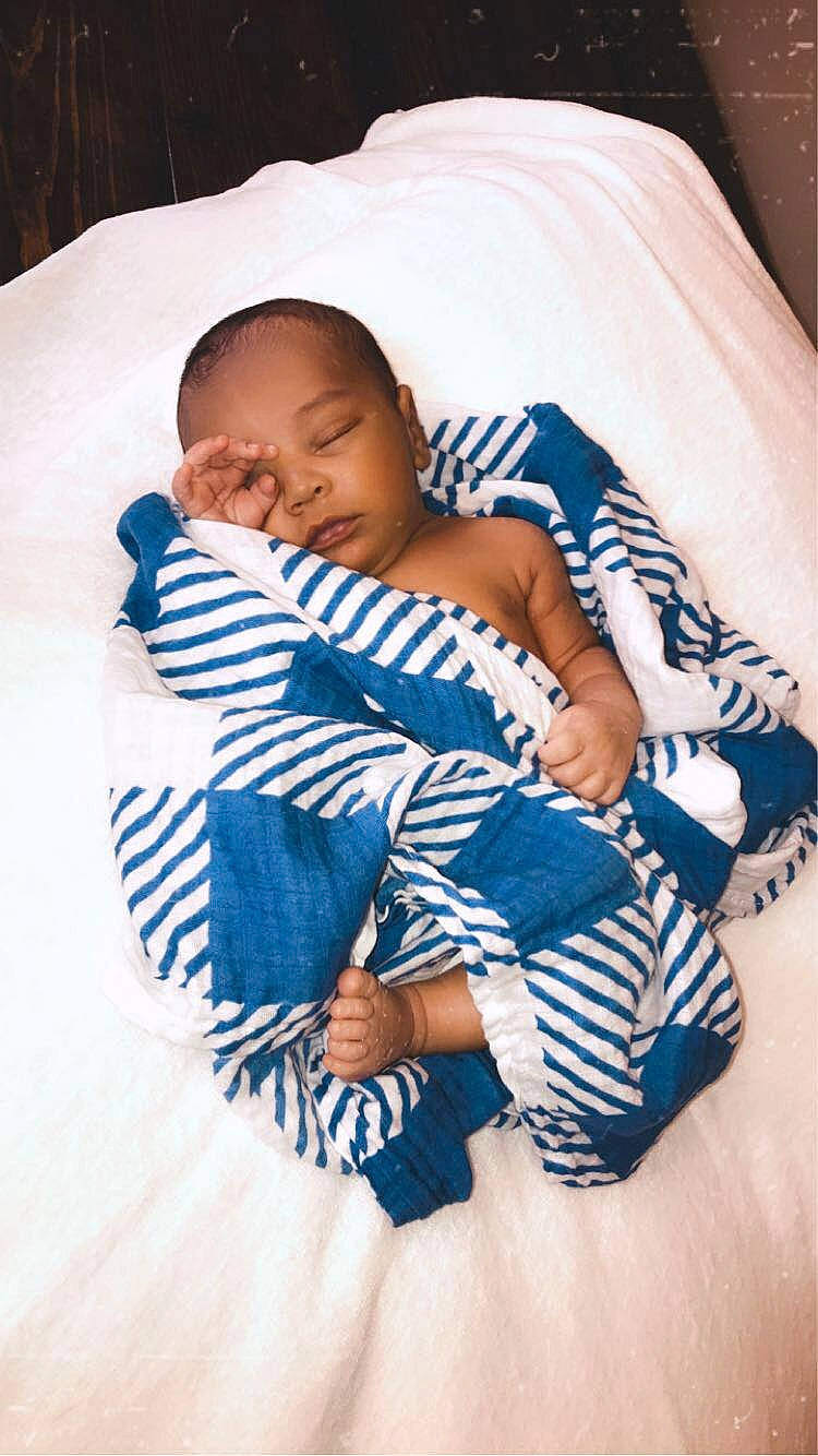 Keelan is registered to the contest to win money with this photo: baby, baby_sleeping, bedtime, blanket, child, comfort, linens, nap, person, sleep, textile, toddler