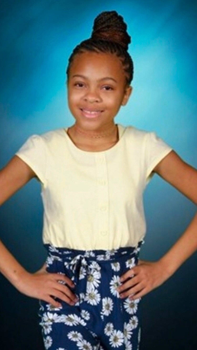 Jesselle joined the competition — help win amazing prizes! black, blue, brown, clothing, ear, facial_expression, fashion, hairstyle, happy, joint, joy, neck, pattern, person, photograph, shoulder, sleeve, standing, style, textile