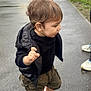 Gurnawab Singh joined the competition — help win amazing prizes! toddler, child, walking, hand_holding, boots, black_sweater, cargo_shorts, outdoor, pavement, wet_surface, adult_hand, side_view, short_hair, casual_clothing, park, greenery, urban, daylight, person, footwear