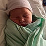 Scarlett joined the competition — help win amazing prizes! architecture, baby, beanie, bed, blanket, bonnet, building, cap, clothing, face, furniture, hat, head, hospital, newborn, person, photography, portrait, sleeping, towel
