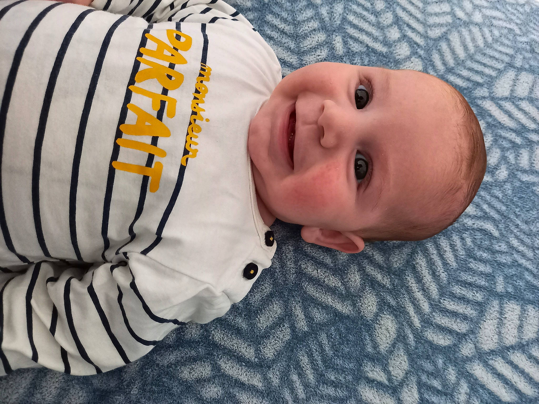 Aaron a rejoint le concours — aidez-le/la à gagner de superbes lots ! baby, baby_laughing, baby_toddler_clothing, baseball, cap, cheek, child, comfort, eye, face, fun, hair, happy, human_body, joy, mouth, nose, person, sleeve, smile