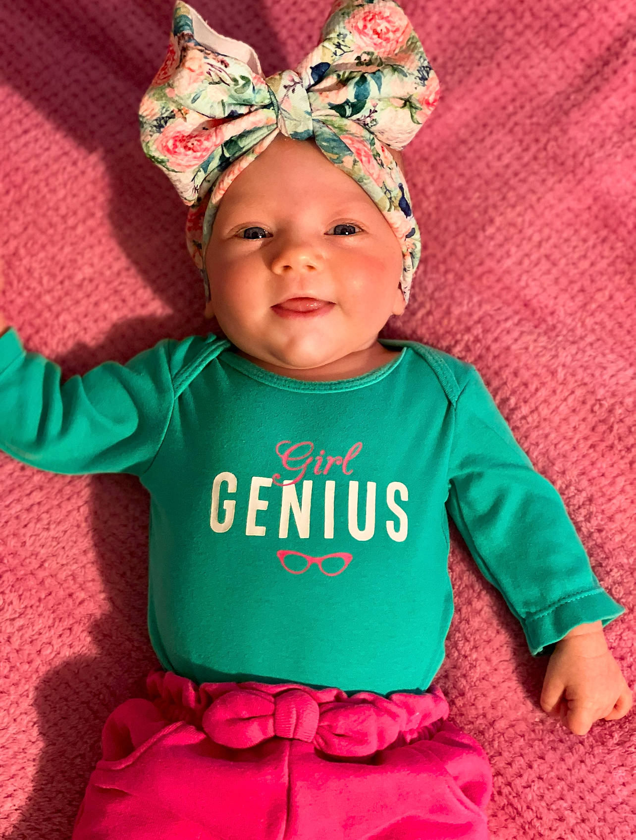 Anessa joined the competition — help win amazing prizes! baby, baby_toddler_clothing, cap, chin, costume_hat, dress, eye, face, glasses, happy, hat, head, headwear, human_body, magenta, neck, person, pink, red, sleeve