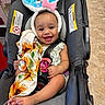 Selena joined the competition — help win amazing prizes! baby, bunny_ears, car_seat, child, smiling, pacifier, blanket, sunflower_pattern, happy, seatbelt, cute, infant, indoor, clothing, toy, headwear, person, foot, holding, accessory