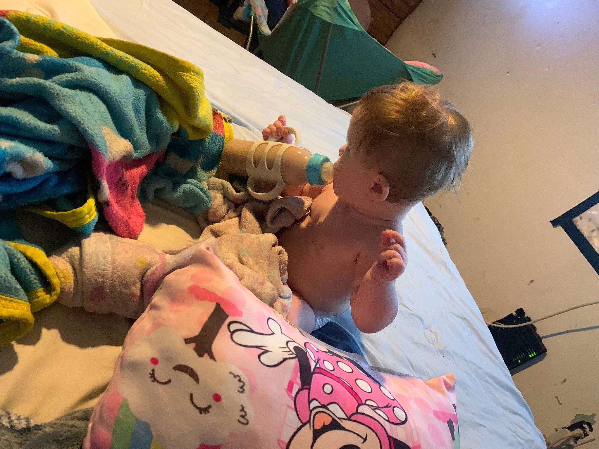 Zoey is registered to the contest to win money with this photo: art, baby, bedding, chest, child, comfort, fun, human_leg, leisure, linens, pattern, person, room, sitting, stuffed_toy, t_shirt, tattoo, tattoo_artist, temporary_tattoo, toddler