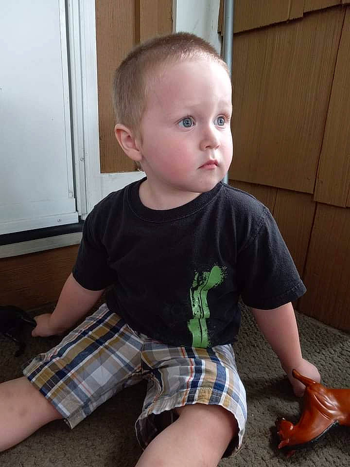 Dominic is registered to the contest to win money with this photo: baby_toddler_clothing, cool, finger, flooring, fun, hair, joint, knee, muscle, neck, person, plaid, shorts, shoulder, skin, sleeve, standing, surprise, t_shirt, tartan