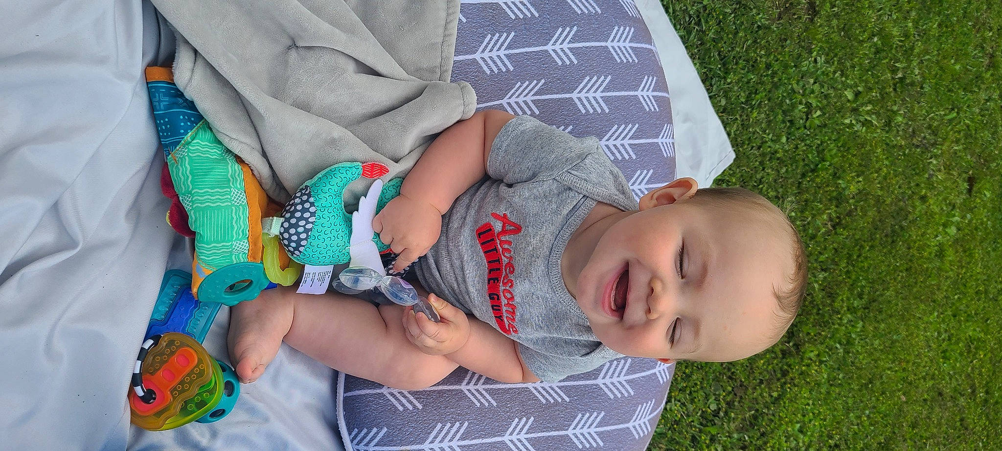 Brantlee joined the competition — help win amazing prizes! arm, baby, baby_products, baby_toddler_clothing, child, finger, grass, hand, happy, joy, mammal, pattern, person, photograph, plant, product, skin, sleeve, smile, summer