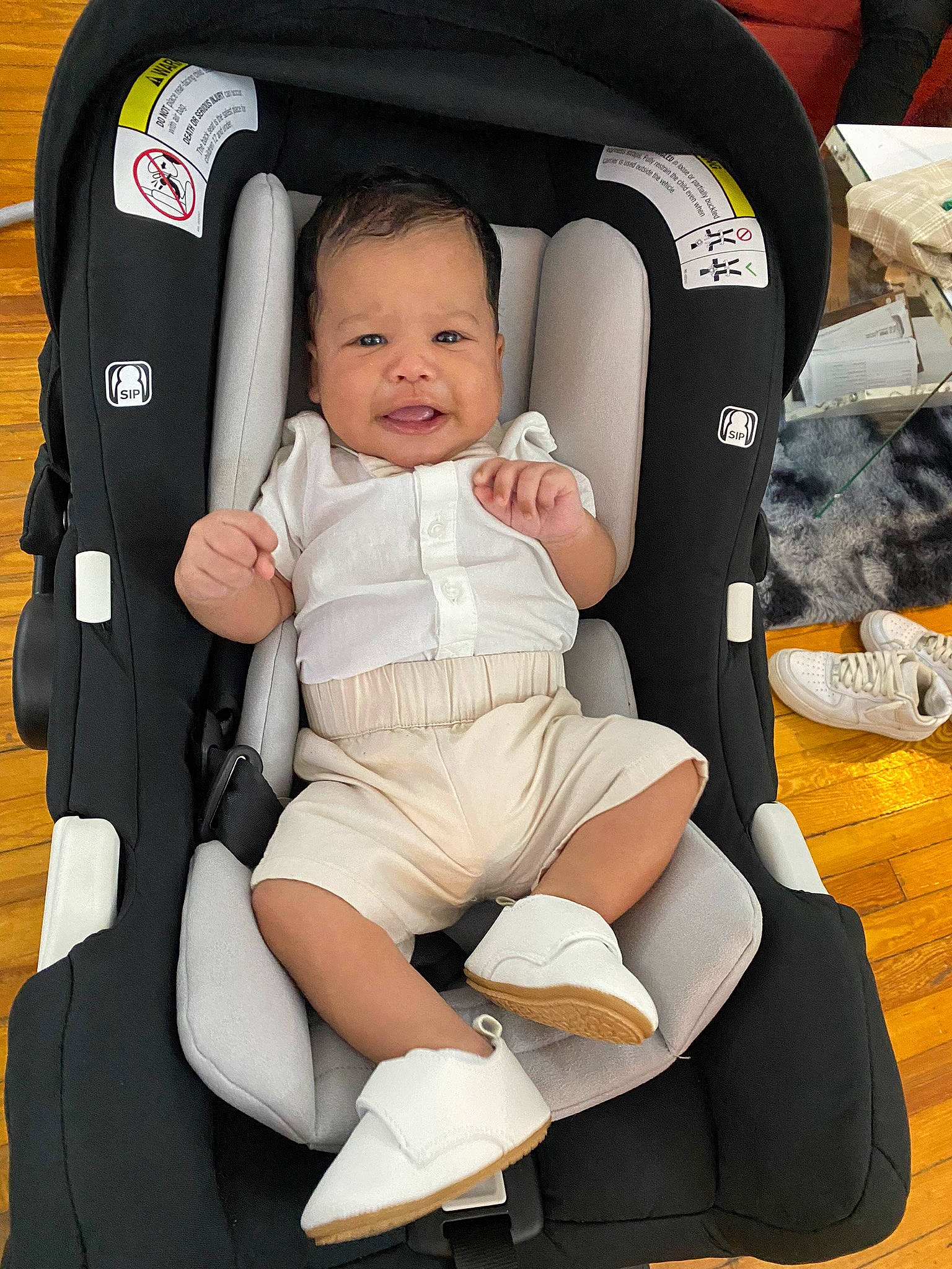Luis joined the competition — help win amazing prizes! auto_part, baby, baby_carriage, baby_products, baby_safety, baby_toddler_clothing, bag, car_seat, chair, child, comfort, foot, human_leg, knee, lap, person, product, sitting, smile, thigh