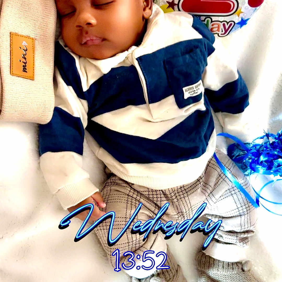 Salmaan joined the competition — help win amazing prizes! baby, blanket, clothing, coat, cushion, face, footwear, glove, hat, head, homedecor, jacket, newborn, pants, person, photography, portrait, shoe, sleeping, toy