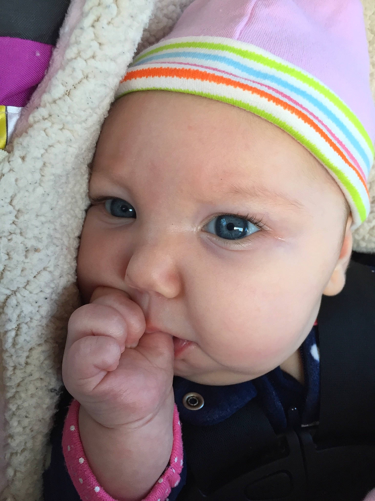 Lisa is registered to the contest to win money with this photo: baby, beauty, cheek, child, chin, close_up, eye, eyebrow, face, facial_expression, finger, forehead, hand, head, headwear, lip, nose, person, pink, skin