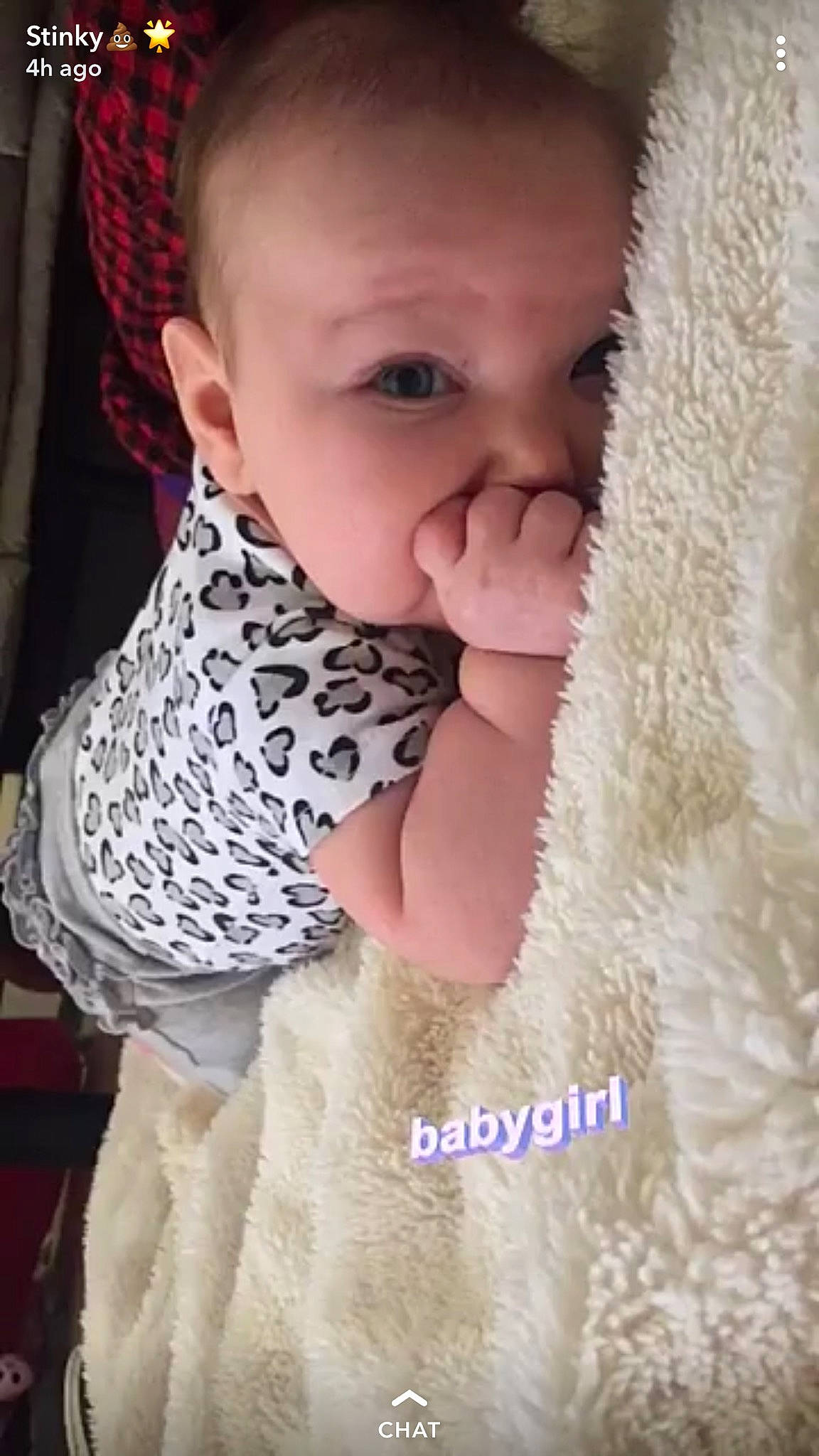 Lisa is registered to the contest to win money with this photo: baby, cheek, child, ear, fur, head, lip, nose, outerwear, person, skin, smile, textile, toddler