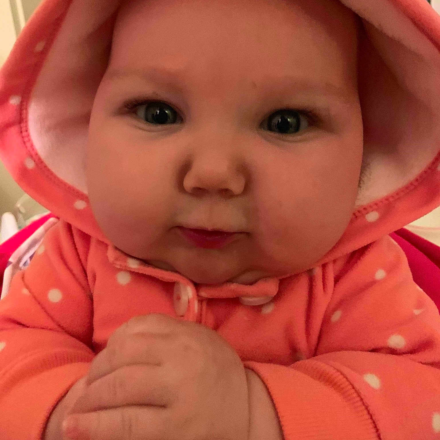 Lisa joined the competition — help win amazing prizes! baby, baby_making_funny_faces, cheek, child, chin, close_up, eye, face, facial_expression, finger, forehead, hand, head, lip, mouth, nose, person, pink, skin, thumb