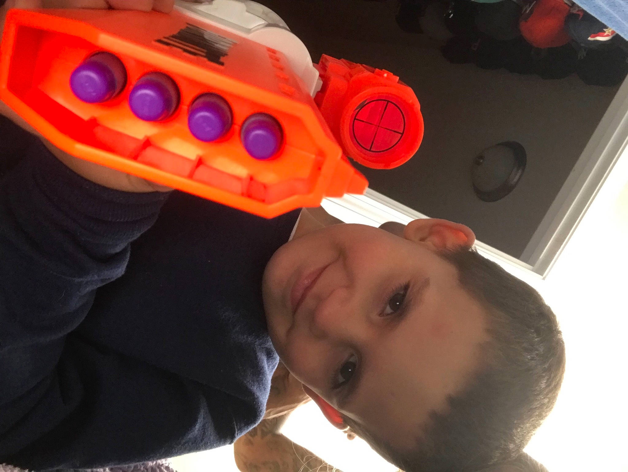 Adonis joined the competition — help win amazing prizes! audio_equipment, auto_part, automotive_design, automotive_exterior, automotive_lighting, automotive_tire, carmine, child, electric_blue, fun, happy, joy, machine, person, personal_protective_equipment, plastic, selfie, smile, t_shirt, toddler