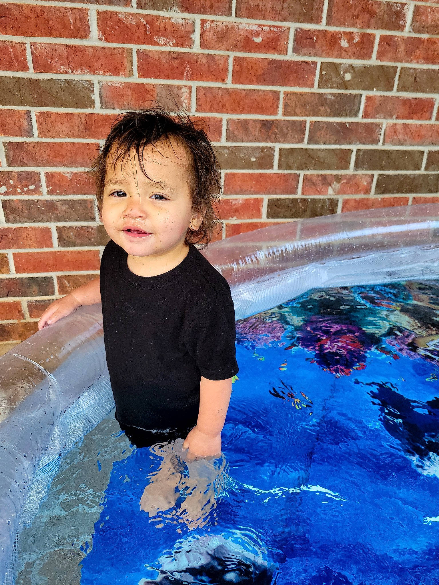 Clarissa joined the competition — help win amazing prizes! arm, bathing, brick, brickwork, child, composite_material, electric_blue, fluid, fun, happy, leisure, liquid, person, photograph, play, recreation, smile, swimming_pool, toddler, water