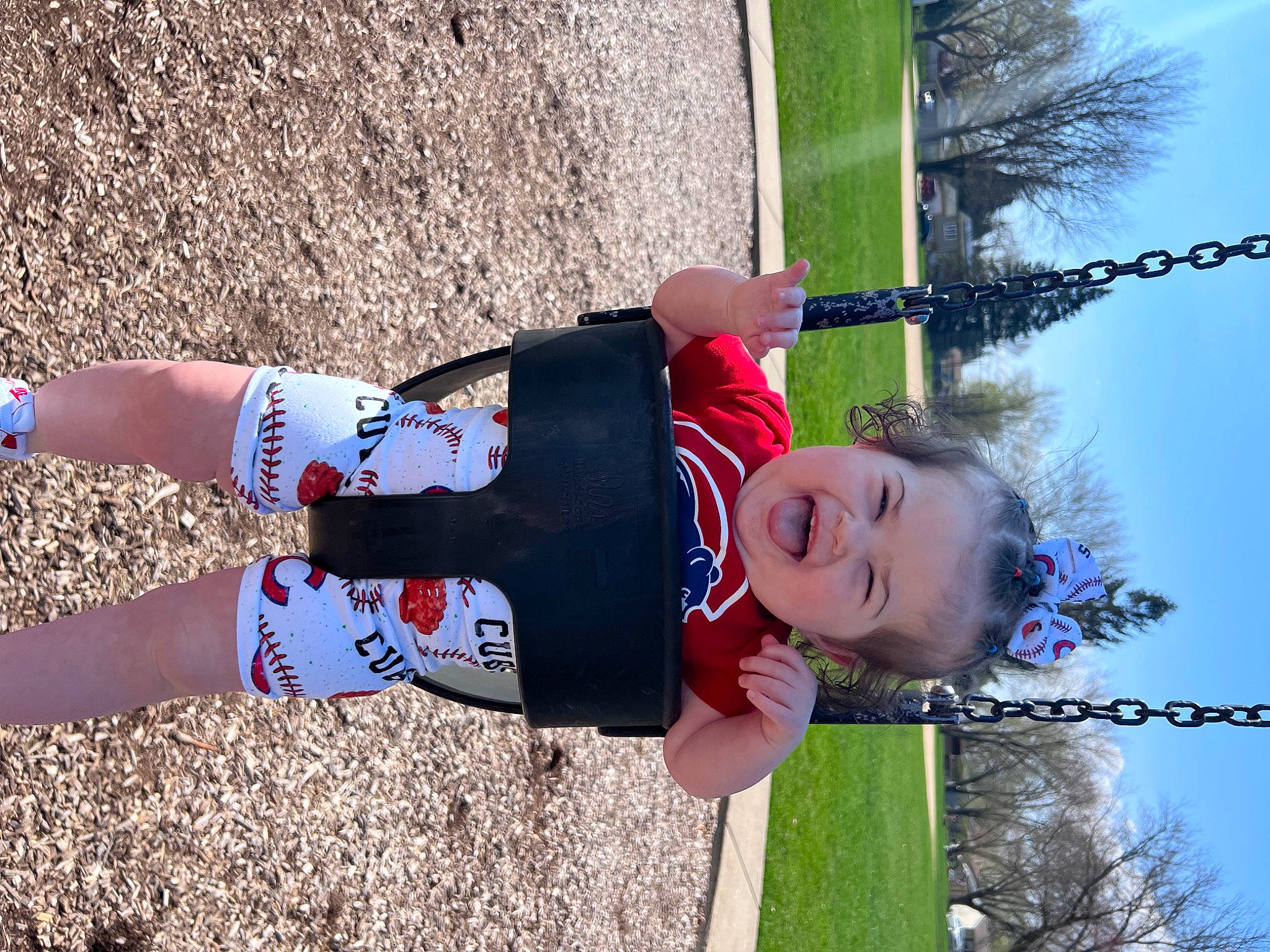Hadley is registered to the contest to win money with this photo: child, fun, grass, happy, human_leg, knee, leisure, person, photograph, plant, recreation, shorts, sky, sock, soil, sports, sportswear, summer, thigh, toddler