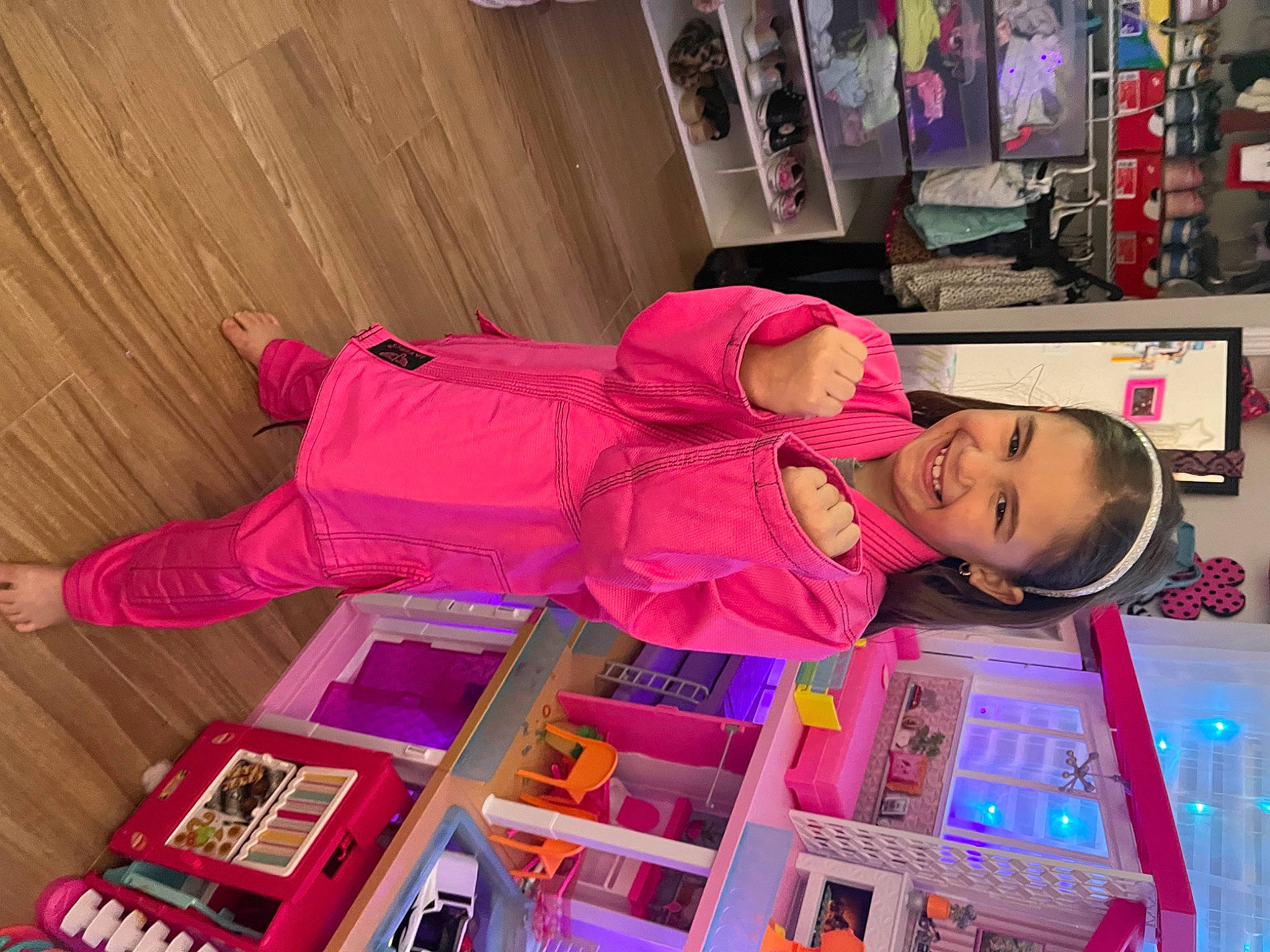 Bristol Lynn is registered to the contest to win money with this photo: baby, building, child, eyewear, flooring, fun, hat, jacket, joy, machine, magenta, person, pink, play, retail, room, sleeve, square, t_shirt, textile
