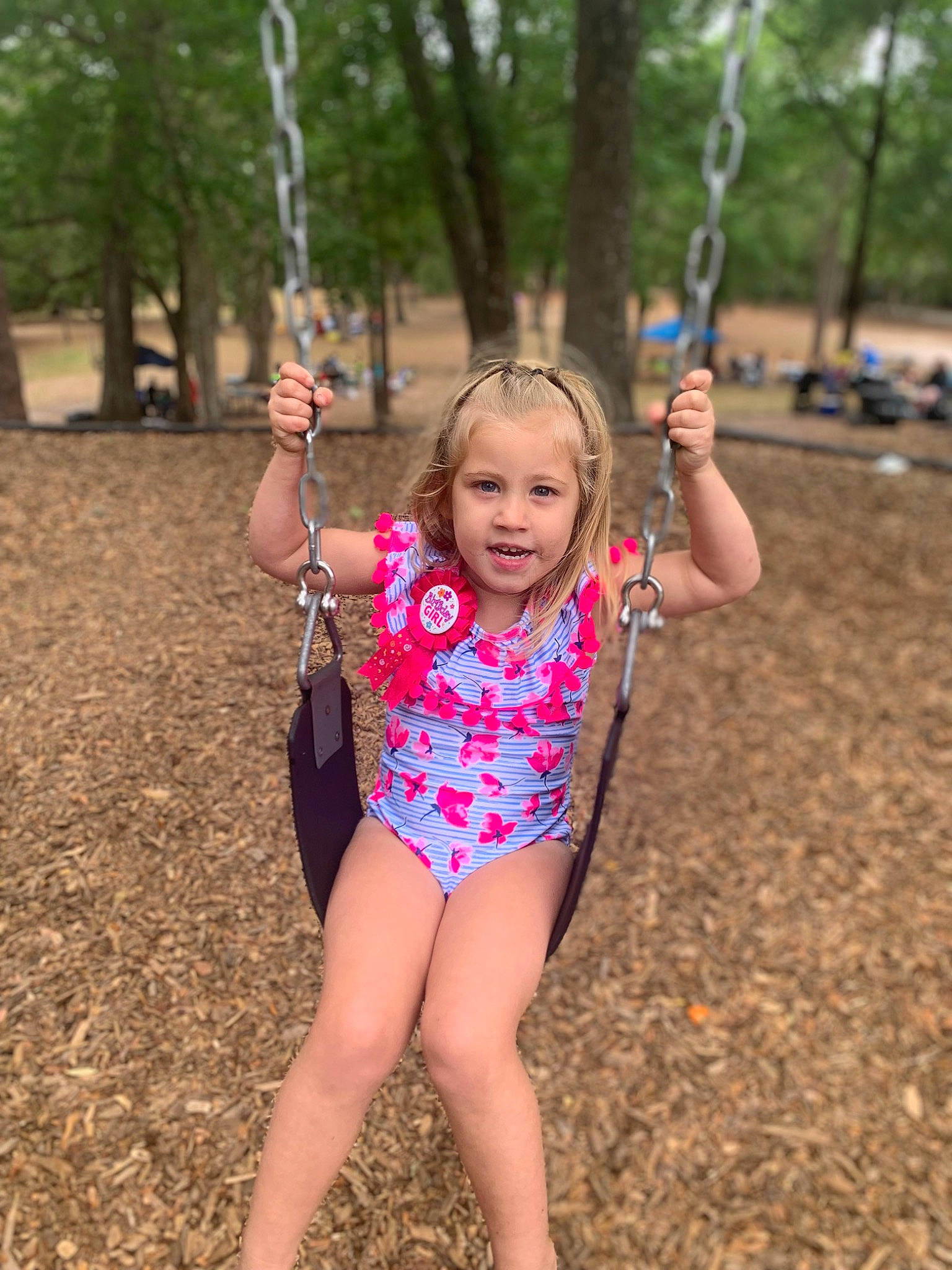 Georgia is registered to the contest to win money with this photo: electric_blue, fun, grass, happy, human_leg, leisure, maillot, monokini, one_piece_swimsuit, people_in_nature, person, plant, soil, summer, swimwear, thigh, thumb, toddler, tree, trunk