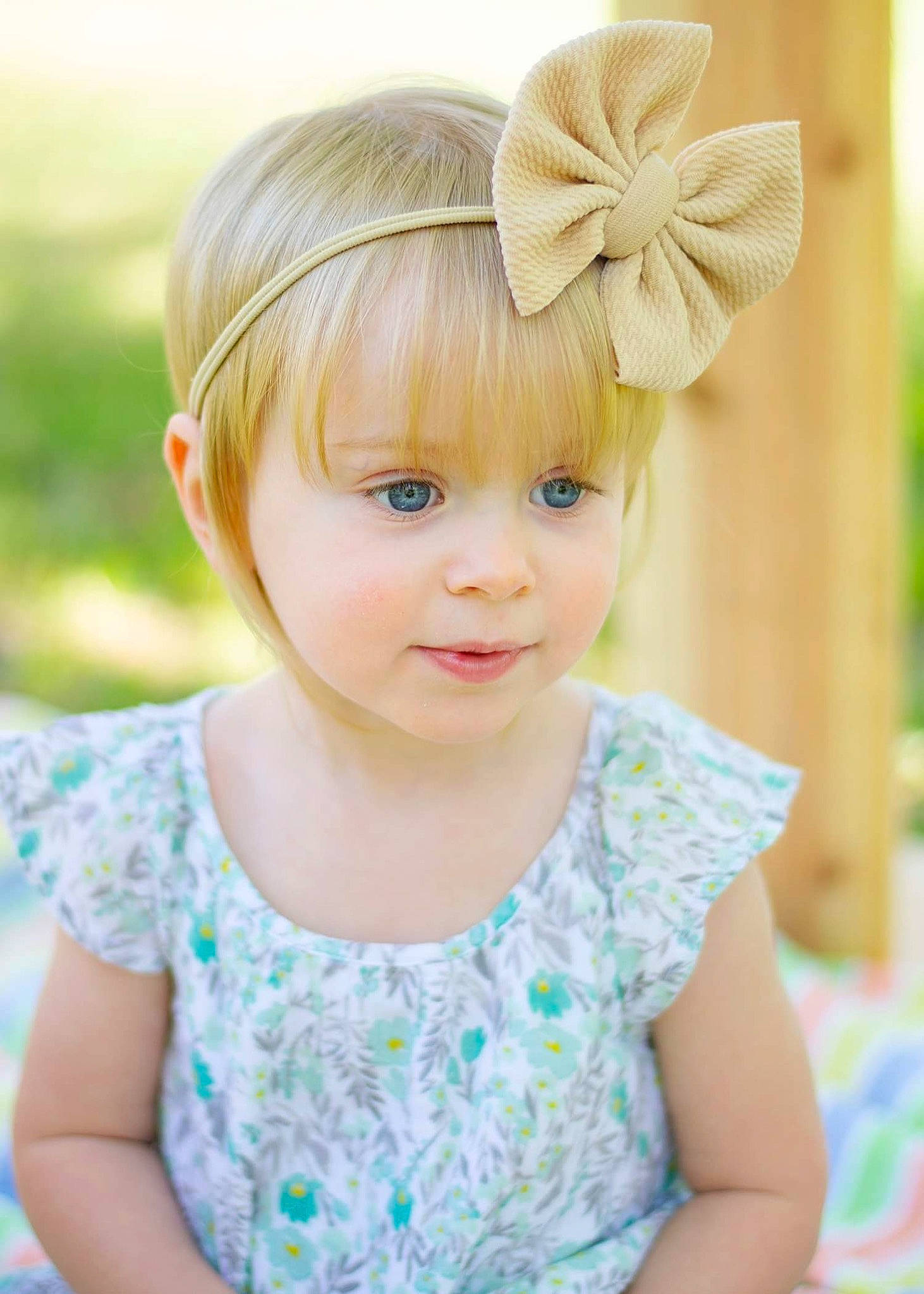 Kinsleigh joined the competition — help win amazing prizes! baby, baby_toddler_clothing, bangs, beauty, blond, brown_hair, child, dress, eye, grass, happy, headband, headpiece, pattern, person, pink, plant, sleeve, smile, toddler