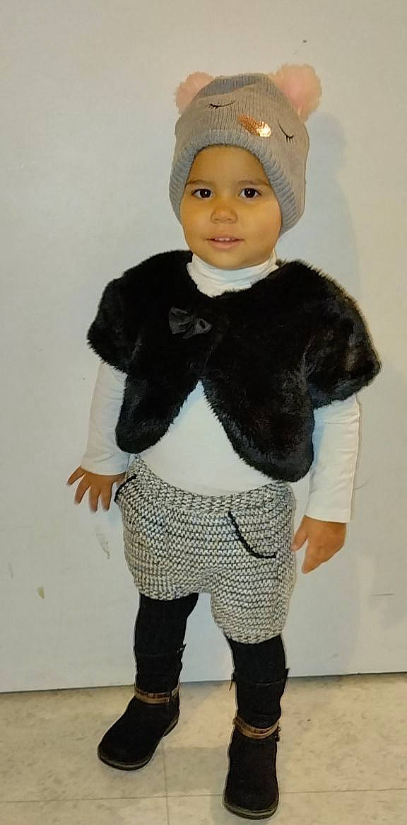 Chiara participe au concours pour gagner de l'argent avec cette photo : art, baby_toddler_clothing, cap, child, costume_hat, doll, fashion_accessory, fashion_design, formal_wear, fur, headgear, headwear, outerwear, pattern, person, sleeve, smile, toddler, toy, wig