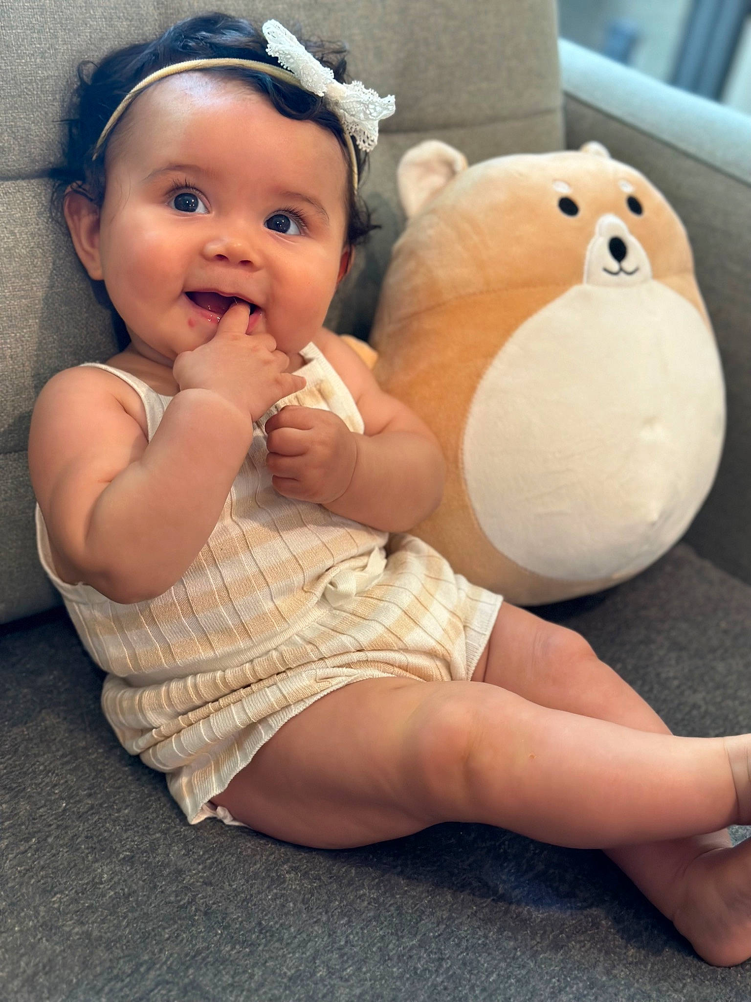 Marina is registered to the contest to win money with this photo: abdomen, baby, baby_toddler_clothing, cheek, comfort, eye, flash_photography, foot, happy, head, human_body, human_leg, leg, nose, person, skin, smile, stuffed_toy, thigh, toddler