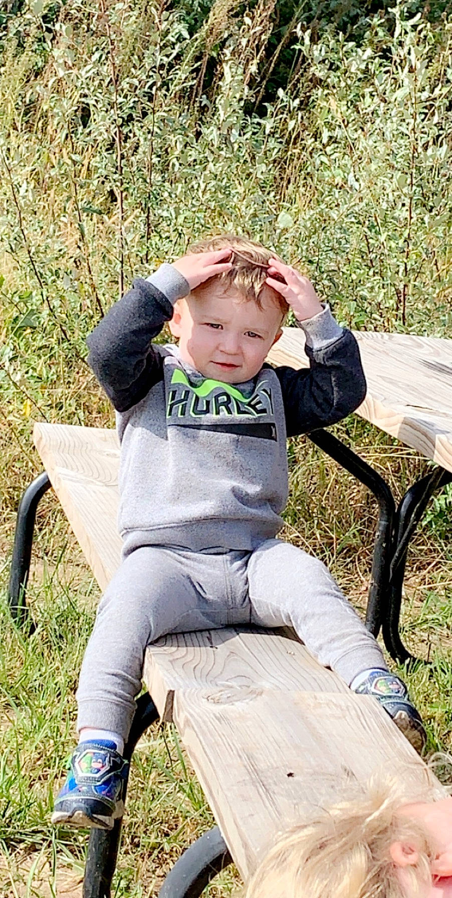 Bentley joined the competition — help win amazing prizes! child, fun, grass, meadow, person, plant, play, sitting, stock_photography, toddler, tree