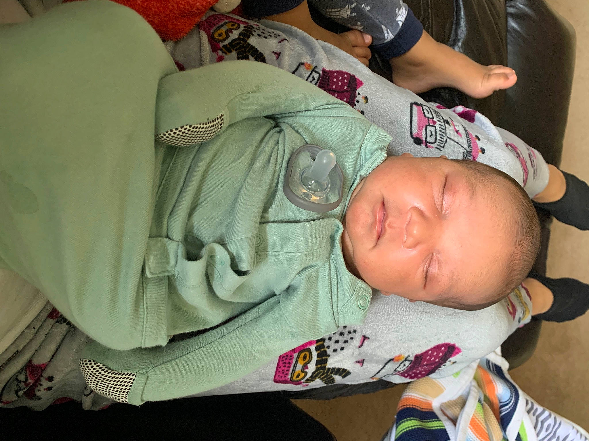 Dallas joined the competition — help win amazing prizes! arm, baby, baby_products, baby_toddler_clothing, child, comfort, elbow, finger, flesh, hand, lap, linens, mouth, nap, pattern, person, sitting, sleep, sleeve, toddler