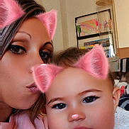 Kiara participe au concours pour gagner de l'argent avec cette photo : artwork, background, cat_ears_filter, child, closeup, clothing, cute, eyes, face, family, fun, hair, indoor, living_room, pink_ears, playful, selfie, smile, toddler, woman