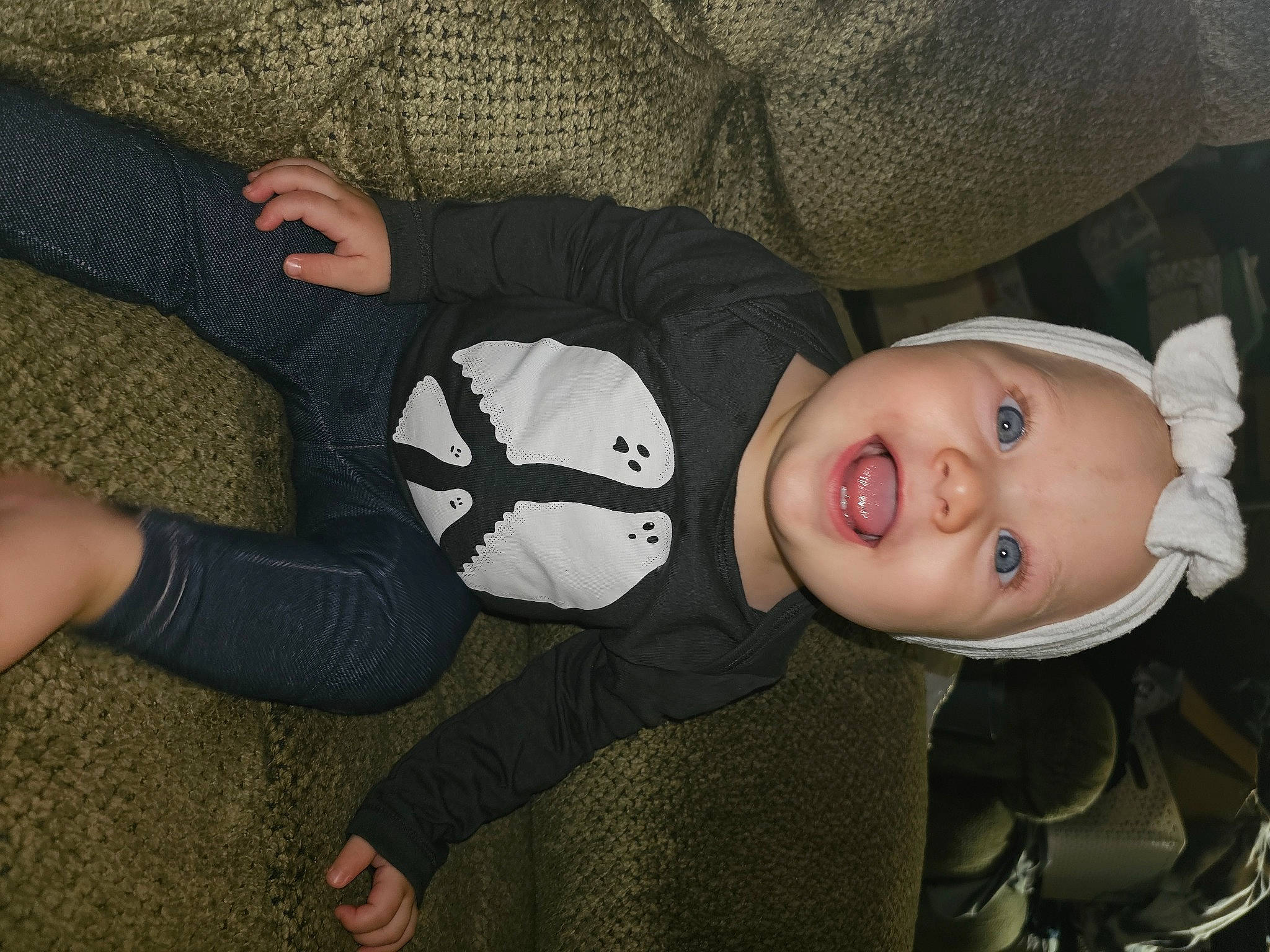 Rylei joined the competition — help win amazing prizes! baby, baby_products, baby_toddler_clothing, child, comfort, couch, finger, flash_photography, fun, hat, headwear, human_leg, knee, person, personal_protective_equipment, sitting, sleeve, sock, textile, thumb
