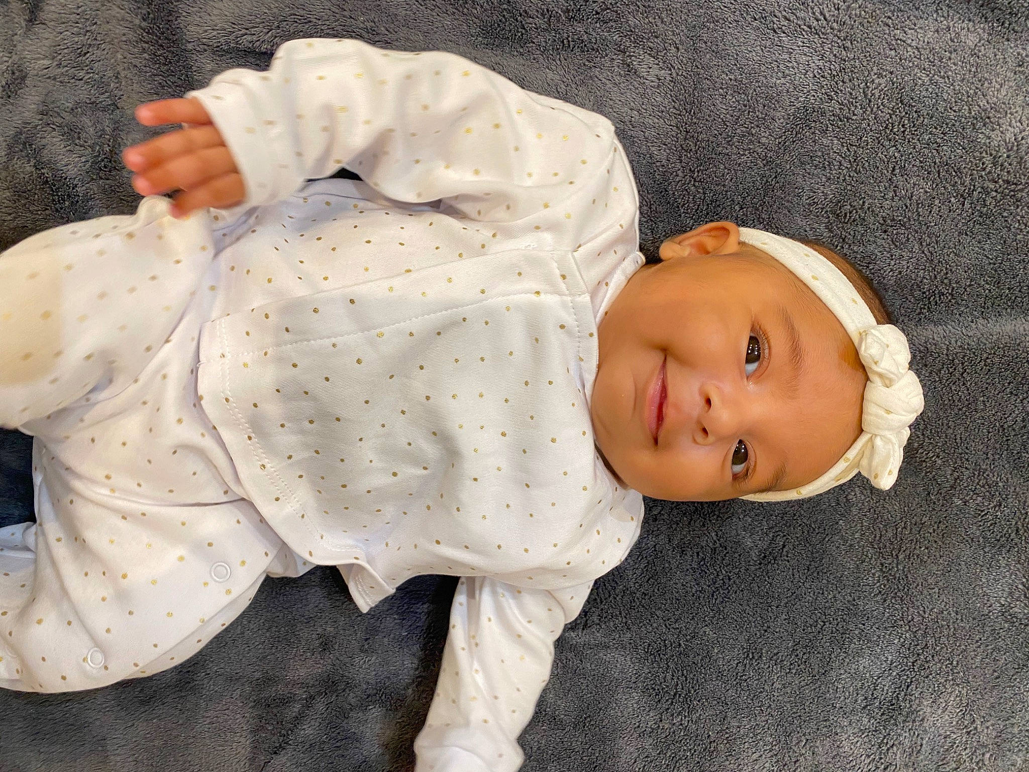 Inaya a rejoint le concours — aidez-le/la à gagner de superbes lots ! baby, baby_products, baby_toddler_clothing, cheek, collar, comfort, doll, dress_shirt, eye, face, fur, hand, head, headgear, headwear, linens, pattern, person, sitting, sleeve