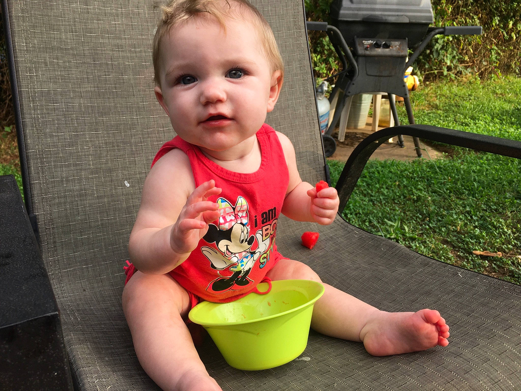 Melia is registered to the contest to win money with this photo: baby, baby_products, baby_toddler_clothing, cheek, child, face, foot, fun, grass, green, happy, leisure, outdoor_furniture, person, photograph, plant, product, sitting, snapshot, thigh