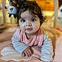baby, infant, curly_hair, play_mat, plush_toy, pink, indoor, child, cute, wide_eyes, soft_texture, hand, clothing, face, portrait, toddler, toy, floor, expression, young_child