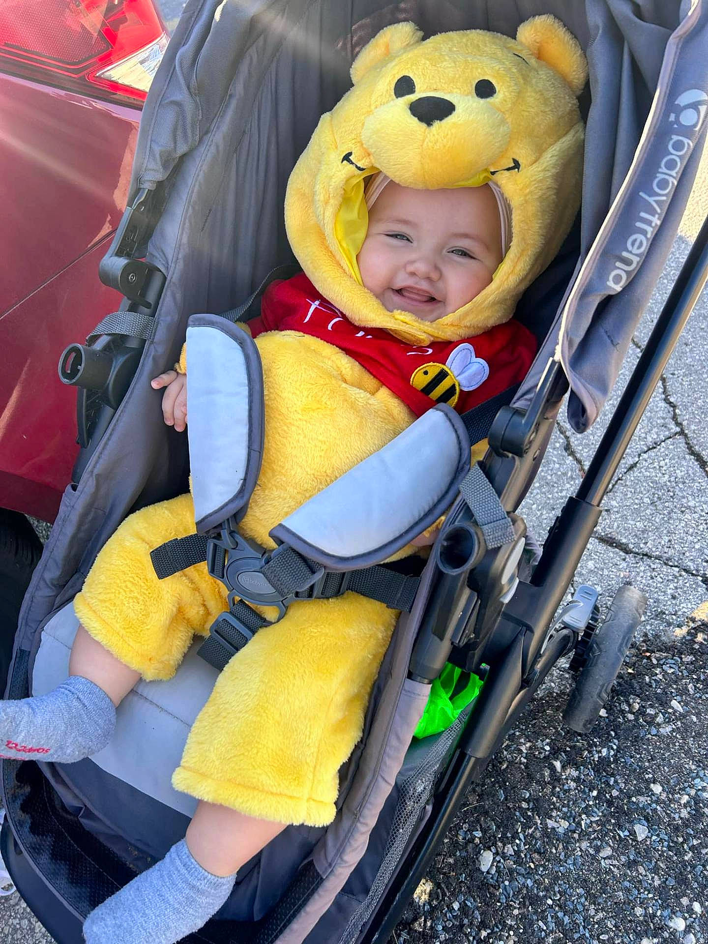 Hasashi joined the competition — help win amazing prizes! accessories, baby, city, clothing, coat, costume, face, gun, happy, hat, head, hood, jacket, person, photography, portrait, smile, stroller, sunglasses, weapon