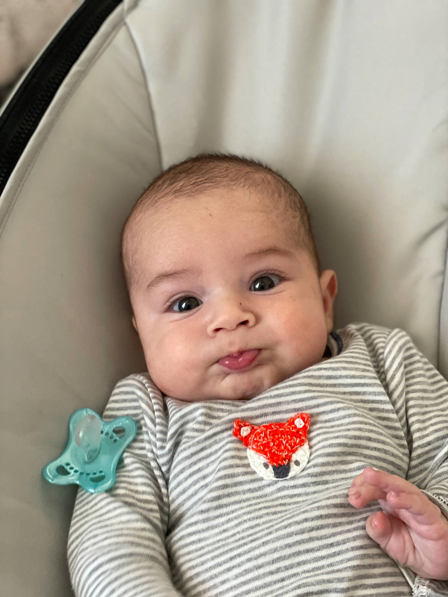 Avi is registered to the contest to win money with this photo: baby, baby_toddler_clothing, cheek, chin, collar, comfort, face, facial_expression, head, iris, lip, mouth, nose, outerwear, person, product, skin, sleeve, textile, toddler