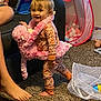 Jazalynn joined the competition — help win amazing prizes! toddler, child, plush_toy, pink, pajamas, carpet, couch, ball_pit, tent, toy, foot, smiling, indoor, person, playroom, barefoot, fabric, colorful, happy, cute