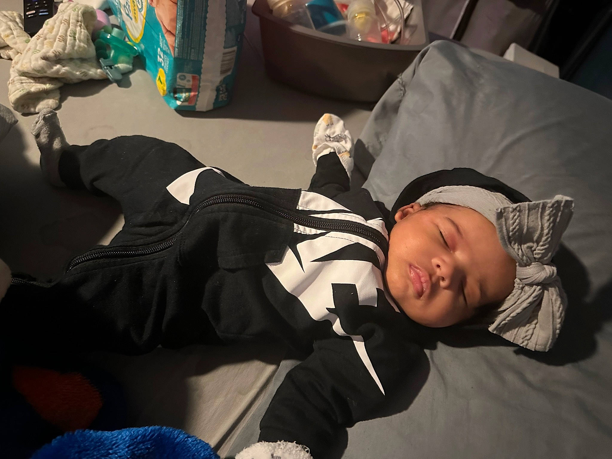 Sade is registered to the contest to win money with this photo: baby, baby_carriage, baby_products, baby_toddler_clothing, child, comfort, fun, headgear, lap, linens, nap, person, room, sitting, sleep, toddler, tree, wood