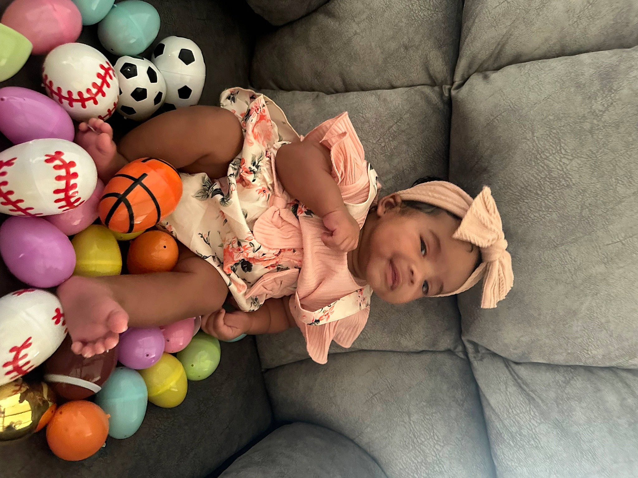 Sade is registered to the contest to win money with this photo: baby, baby_sleeping, baby_toddler_clothing, child, comfort, couch, easter, egg, event, fun, happy, headwear, holiday, linens, mammal, person, sitting, stuffed_toy, sweetness, textile